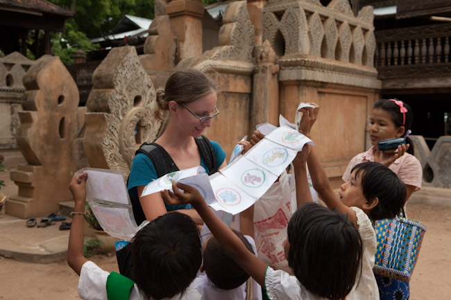 Kids Trying to Sell Their Drawings Outside a Temple Kids Trying to Sell Their Drawings Outside a Temple
