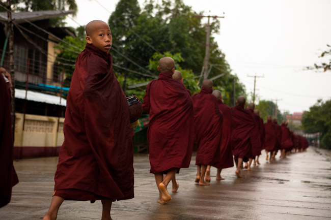 Monks Collecting Alms in the Morning in Bago, Myanmar Monks Collecting Alms in the Morning in Bago, Myanmar